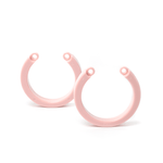 one large and one x-large size pink u-rings next to each other on white background