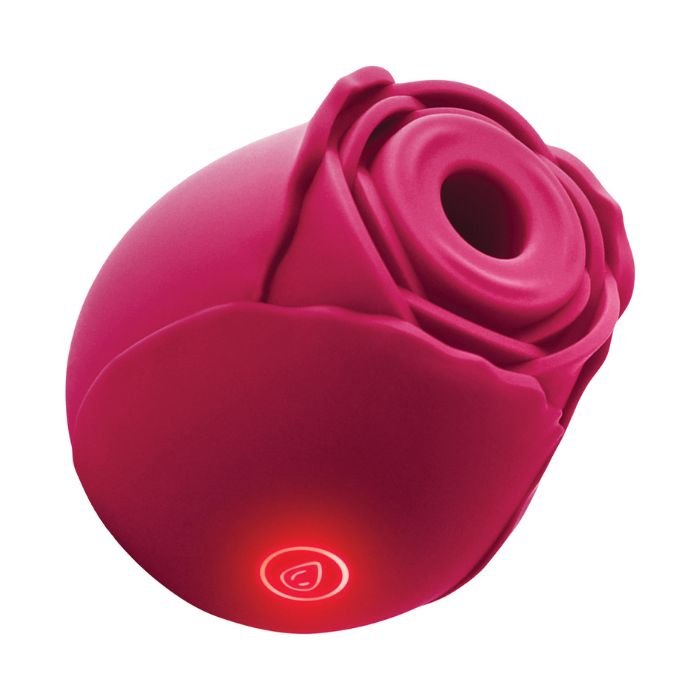 red rose clit suction vibrator with backlit button tilted to the right