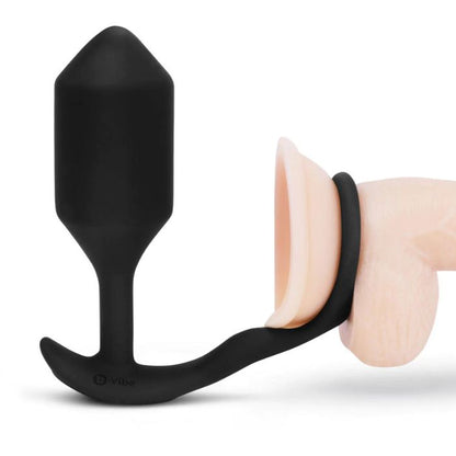 side view black b-vibe snug and tug with butt plug and attached cock ring, connected to a flesh tone dildo base