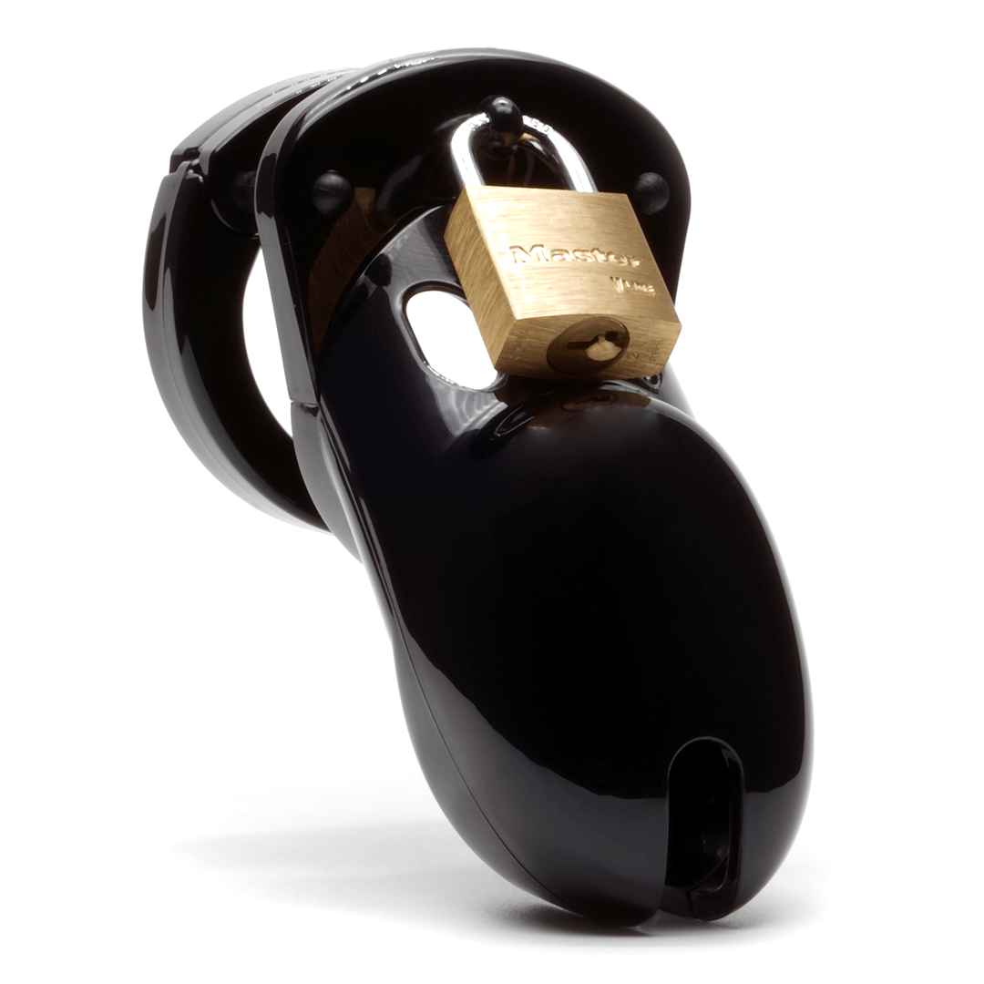 Front view, with tip angled to the right of a fully-assembled black CB-3000 penis chastity cage. Three black locking pins connect the base ring to the penis cage and a brass padlock is secured through a hole on the center locking pin.