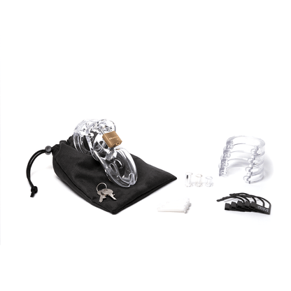 Fully assembled clear CB-3000 chastity cage sitting on black cotton storage pouch with 2 metal keys to left. 3 white locking pins, 3 clear spacers, 4 clear U-rings and 5 black plastic locks lay out to the right.