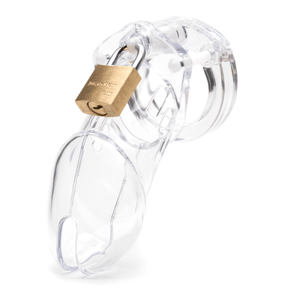 Front view, with tip angled to the left of a fully-assembled clear CB-6000 penis chastity cage. Three white locking pins connect the base ring to the penis cage and a brass padlock is secured through a hole on the center locking pin.