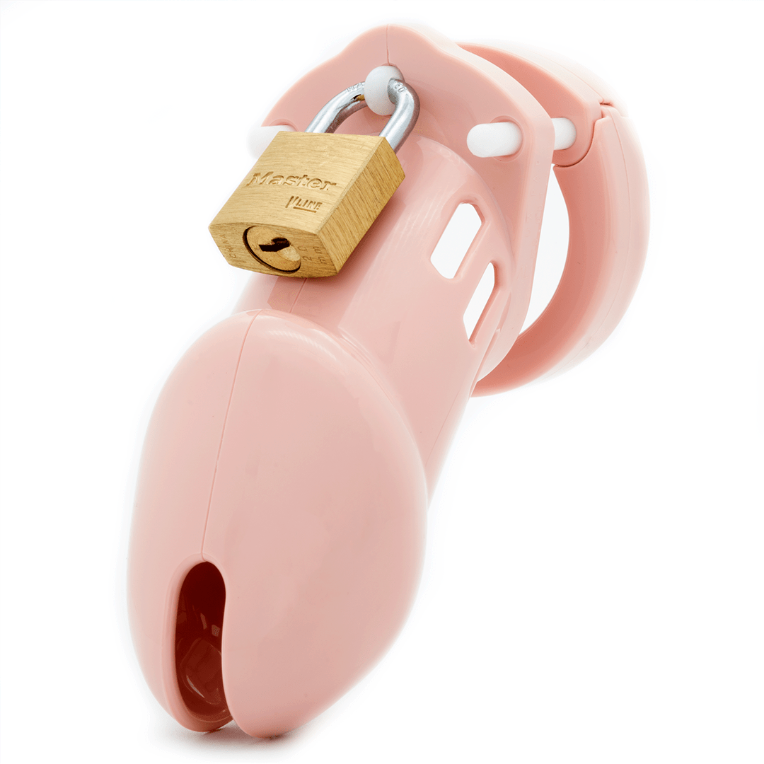 Front view, with tip angled to the left of a fully-assembled pale bubblegum pink CB-6000 penis chastity cage. Three white locking pins connect the base ring to the penis cage and a brass padlock is secured through the hole on the center locking pin.