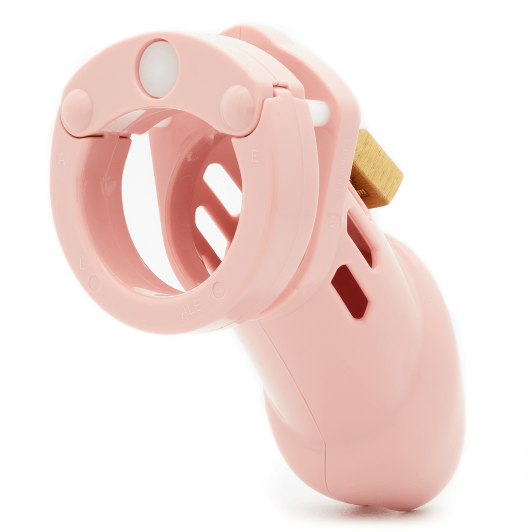 Back and side view, with tip angled to the right of a fully-assembled pale bubblegum pink CB-6000 penis chastity cage.