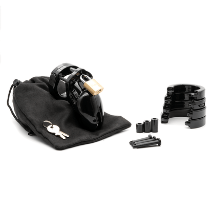 Fully-assembled black CB-6000s chastity cage on a black cotton storage pouch with 2 metal keys to left. 3 black spacers, 3 black locking pins, 4 black stacked U-rings sit displayed on right.