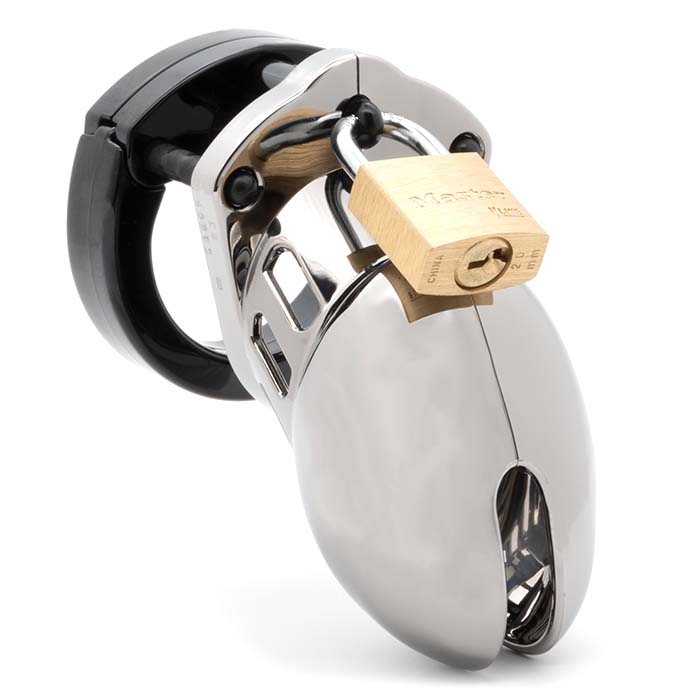 Front view, with tip angled to the right of a fully-assembled chrome finish and black CB-6000s penis chastity cage. Three black locking pins connect the black base ring to the chrome-finish penis cage and a brass padlock is secured through the hole on the center locking pin.