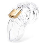 Front view, with tip angled to the left of a fully-assembled clear CB-6000s penis chastity cage. Three white locking pins connect the base ring to the penis cage and a brass padlock is secured through the hole on the center locking pin.