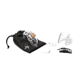 Fully-assembled clear CB-6000s chastity device on a black cotton storage pouch with 2 metal keys, 3 clear spacers, 3 white locking pins, 4 clear U-rings and 5 black plastic locks.
