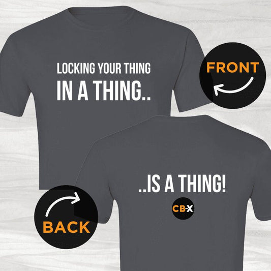 front and back view of grey t-shirt with white writing on front "locking your thing in a thing" and back "is a thing!" and black circle orange and white CB-X logo