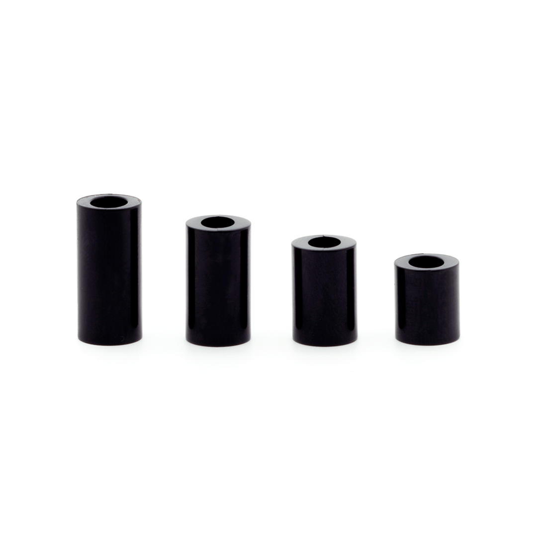 set of four black spacers in four sizes