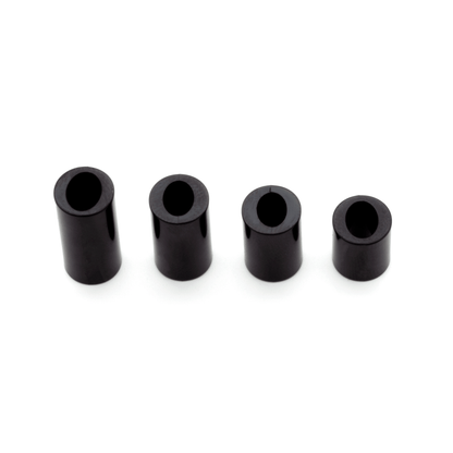top view set of four black spacers in four sizes