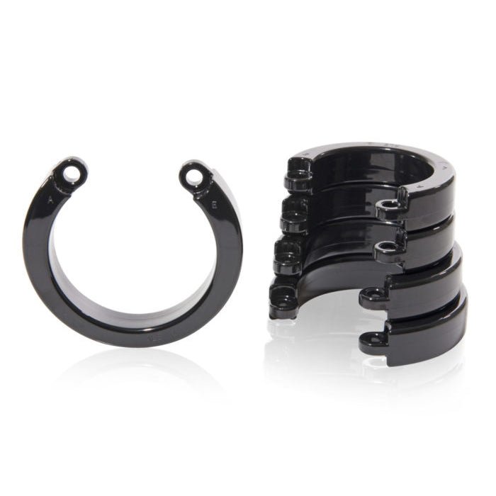 single black CB-X Replacement U-ring next to stack of black clear u-rings