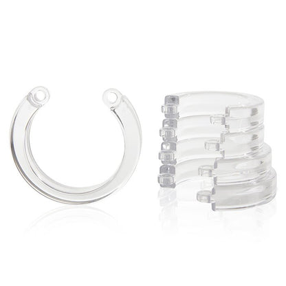 single clear u-ring next to stack of four clear u-rings