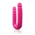 hot pink double ended silicone dildo with realistic penis veins and head on each end.