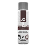 Front of System JO® Coconut Hybrid Silicone-Free lubricant 4 ounce bottle. Bottle is clear with brown accents with a silver cap.