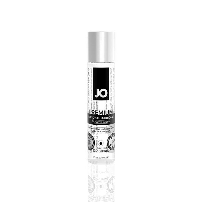 Front of System JO® Premium Silicone lubricant 1 ounce bottle. Bottle is clear with black accents and black or silver text with a silver cap.