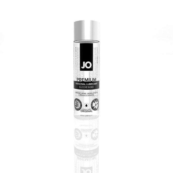 Front of System JO® Premium Silicone lubricant 8 ounce bottle. Bottle is clear with black accents and black or silver text with a silver cap.