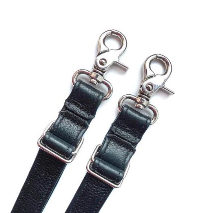 two kinklab bound o round bed bondage straps with silver metal strap adjustors and clips