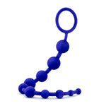 hanging blue string of Silicone Anal Beads with 10 beads starting from smallest to largest and increasing in size up to the removal ring