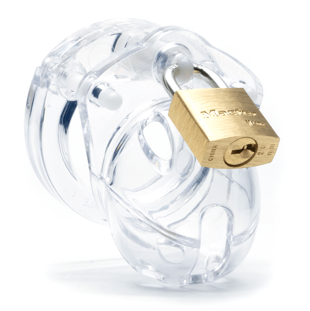 1.25 inch clear penis chastity device assembled with a brass lock secured through the center locking pin.