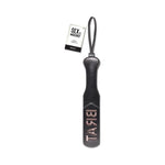 black Sex & Mischief Paddle with the word BRAT cut out of one paddle, with black handle