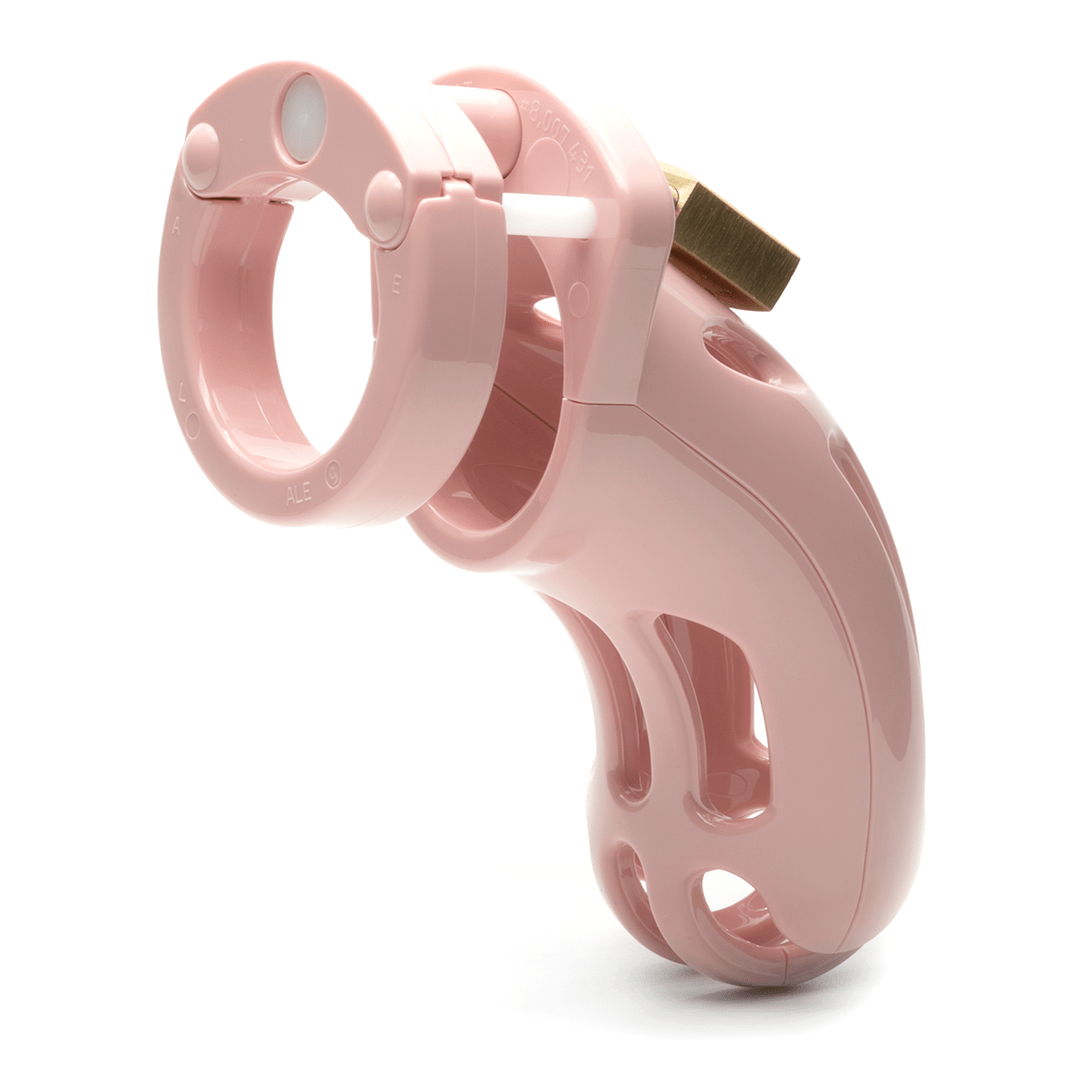 back side view of curve pink CB-X chastity kit full assembled with cage angled to the right
