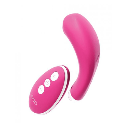 side view VeDO Niki pink Flexible Panty Vibe and pink remote with sliver buttons and silver accents